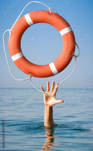 Lifebuoy for man in danger. Rescue situation concept.
