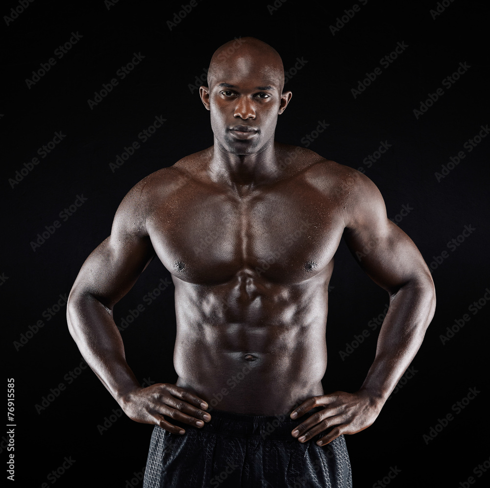Strong afro-american man showing off his physique