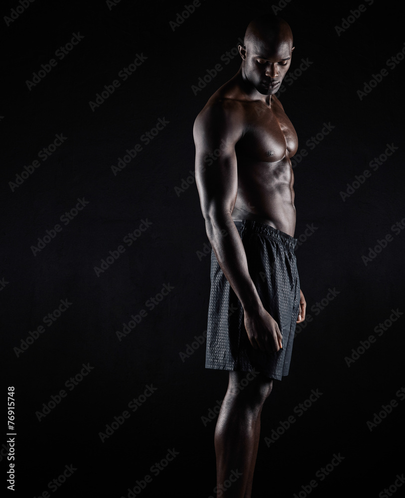 Bodybuilder with muscular physique Bodybuilder with muscular physique