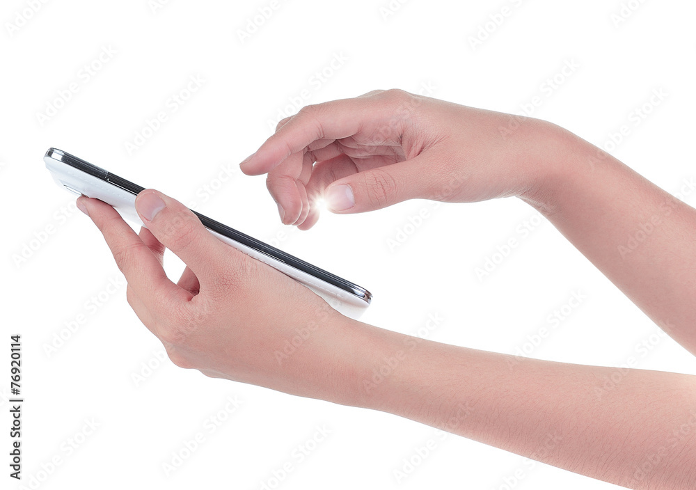 Naklejka premium Hand holding and operating a smart phone isolated on white
