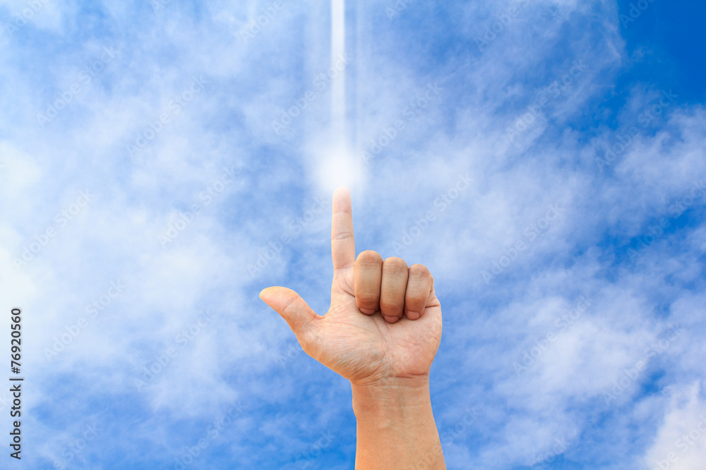 one hand pointed in to the clear blue sky one hand pointed in to the clear blue sky