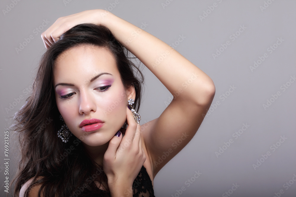 Portrait of young beautiful woman with makeup