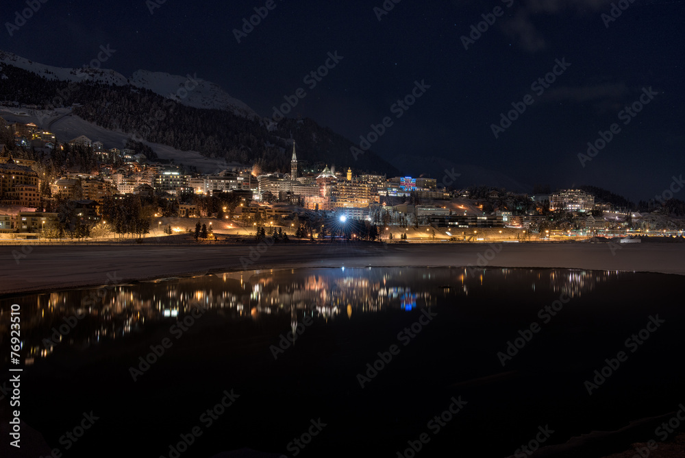 St.moritz mirrored in the lake