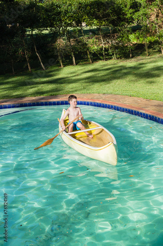 Boy Canoe Pool © ChrisVanLennepPhoto