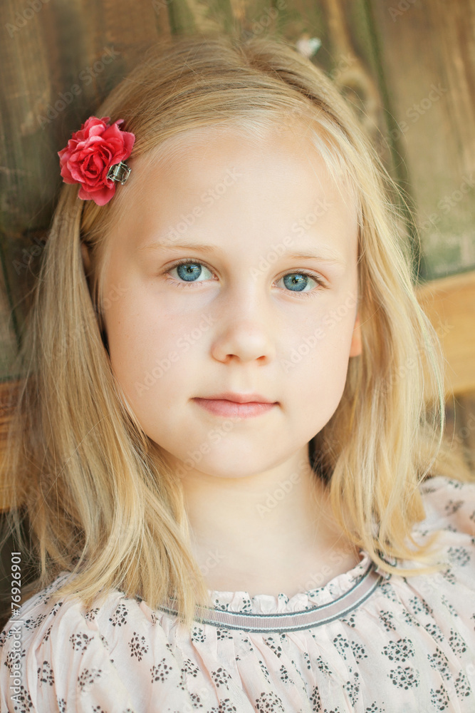Beautiful young girl relaxing outdoors on a sunny day Beautiful young girl relaxing outdoors on a sunny day