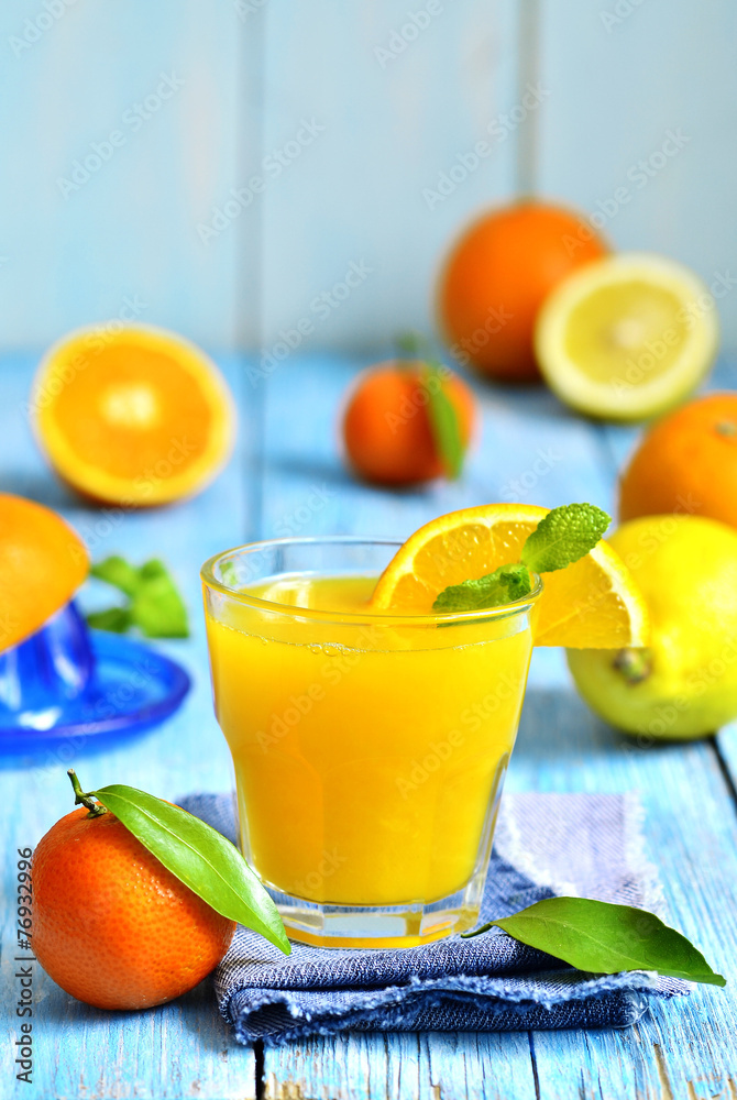 Fresh citrus juice in a glass. Fresh citrus juice in a glass.