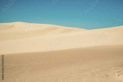 Abstract big sand dunes with clear blue sky. Port Alfred. Easter