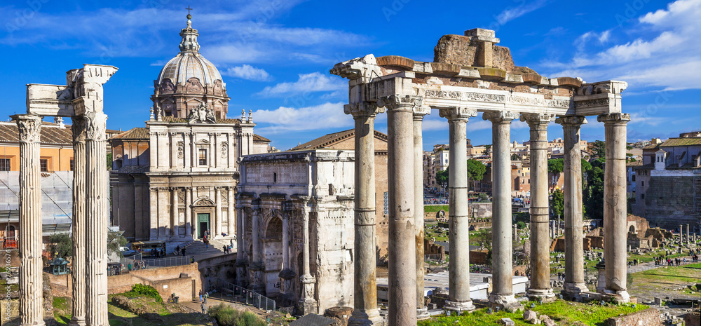 Fototapeta premium Roman Forum Rome Italy Ancient Ruins Panoramic View Temple Column Imperial Forum Antique Architecture Landmark Foro Romano Capital Cityscape Travel Photography Stock Photo