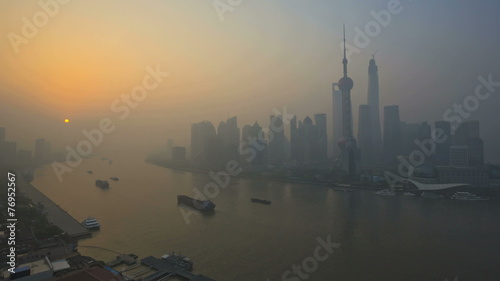 Time lapse sunrise Huangpu River Shanghai World Financial Center  photo