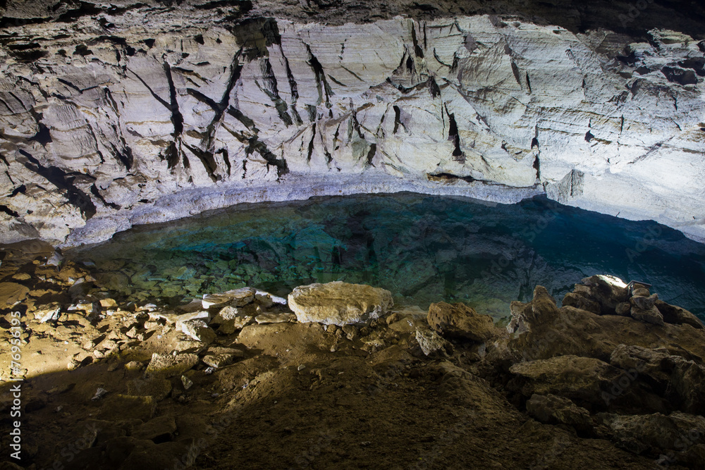 . Kungur Ice Cave. Transparent greenish water in the lake . Kungur Ice Cave. Transparent greenish water in the lake