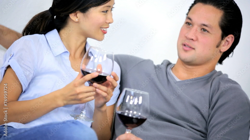 Happy Asian Chinese Couple Home Couch Enjoying Glass Wine Happy Asian Chinese Couple Home Couch Enjoying Glass Wine