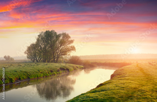 Colorful summer sunrise on the river