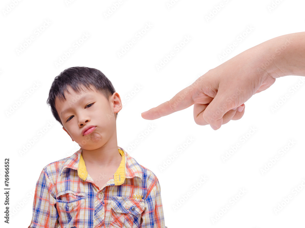Displeased Boy boring from his parent command. Displeased Boy boring from his parent command.