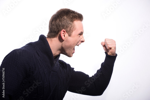 Image of furious young man shouting