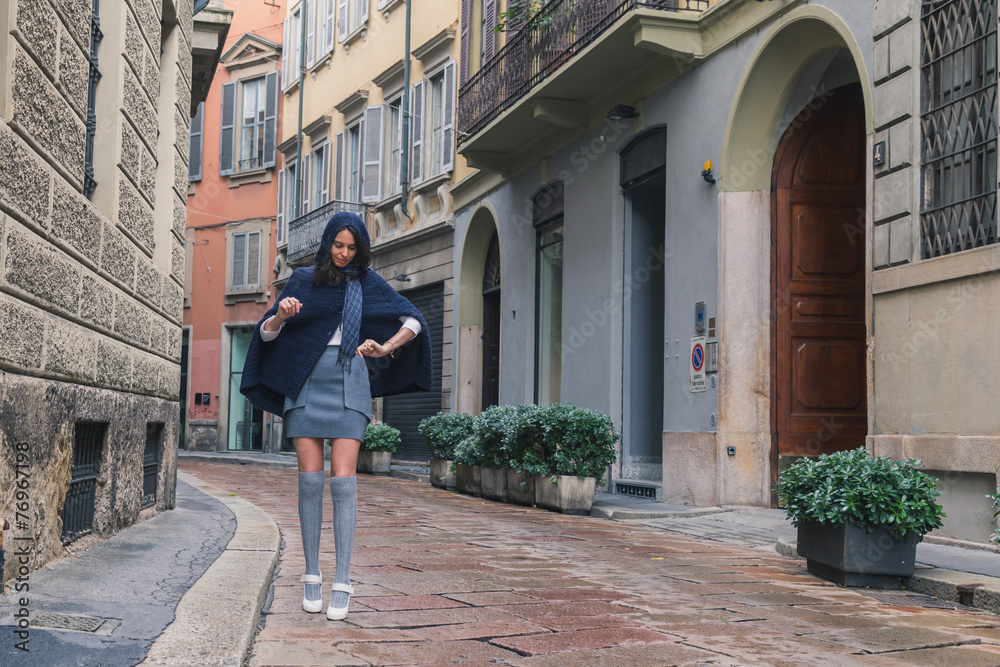 Beautiful girl posing in the city streets Beautiful girl posing in the city streets