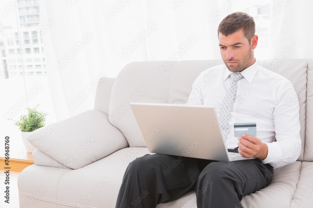 Businessman buying things in internet Businessman buying things in internet