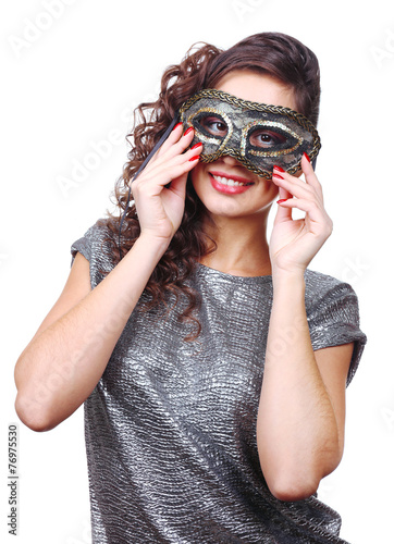 Beautiful girl with masquer...
