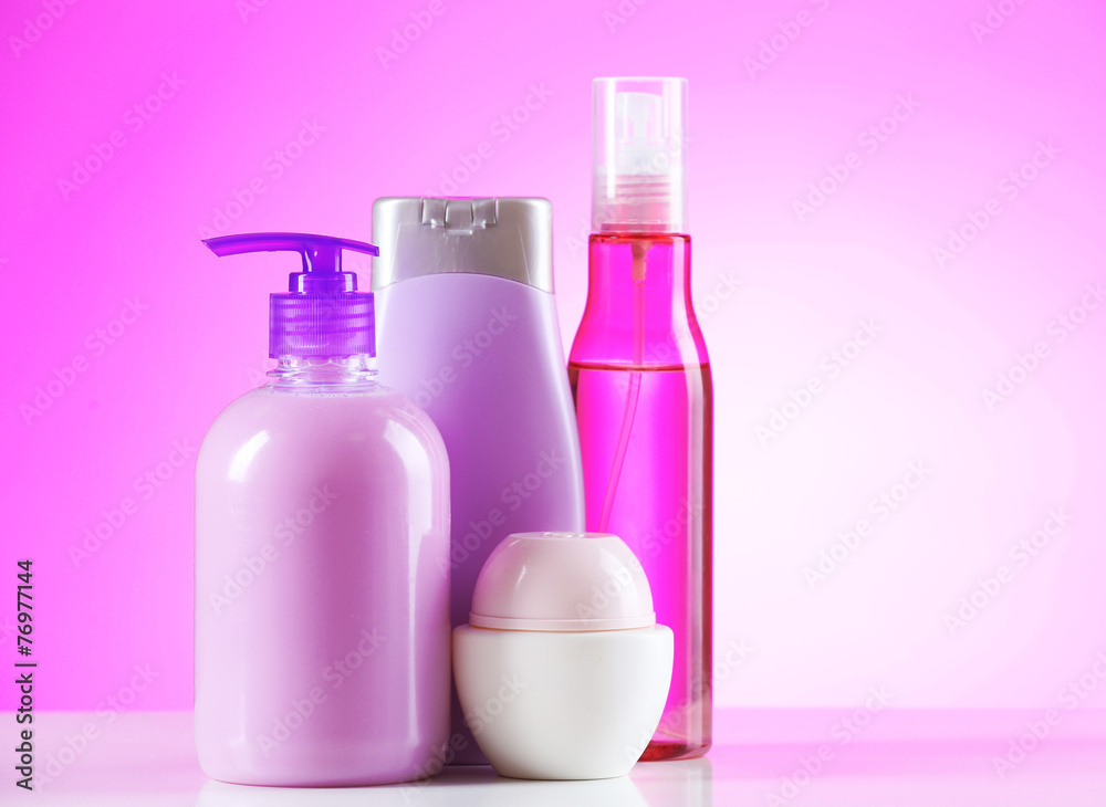 Cosmetic bottles on bright background Cosmetic bottles on bright background