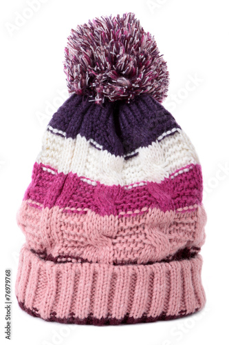 Pink knitted stripe pattern winter bobble ski knit hat isolated white background photo