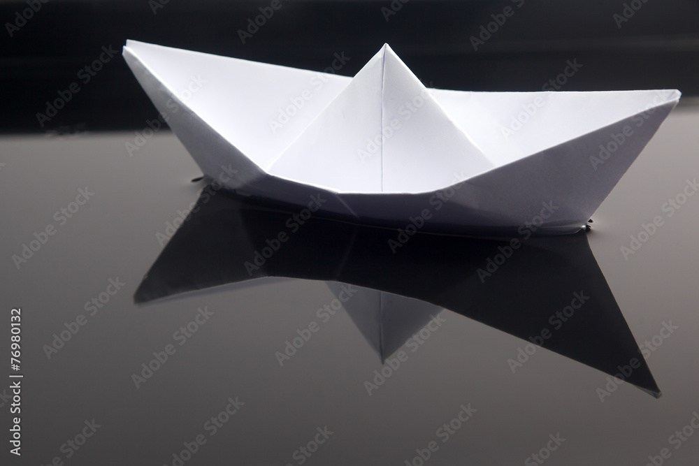 Paper boat in water Paper boat in water