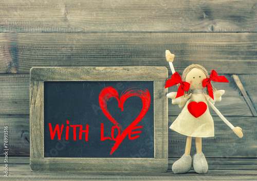 Funny girl with Red Heart. Valentines Day balckboard With Love photo