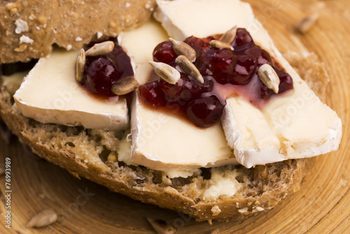 bread served with camembert and cranberry