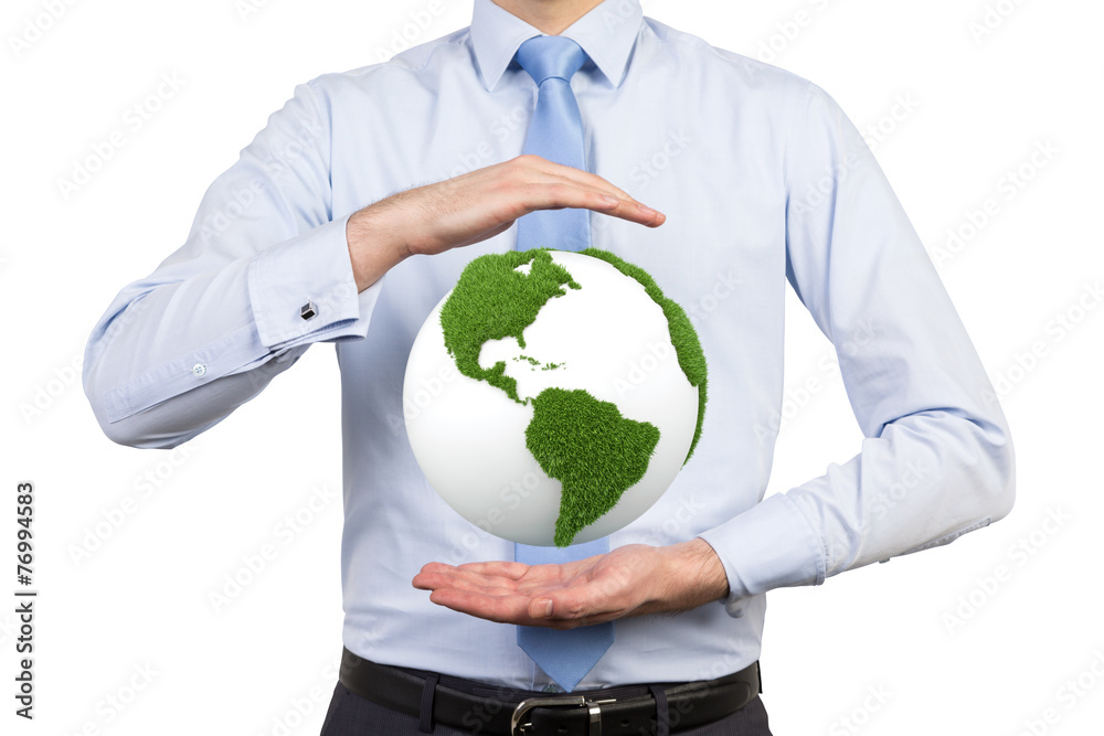 businessman holding earth