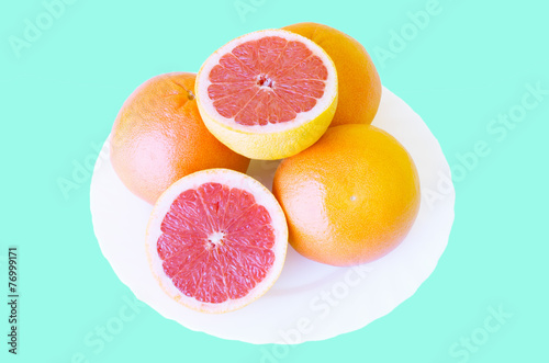 Delicious grapefruit on a white plate
