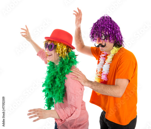 Man and Woman dressed in carnival costumes dancing a polonaise