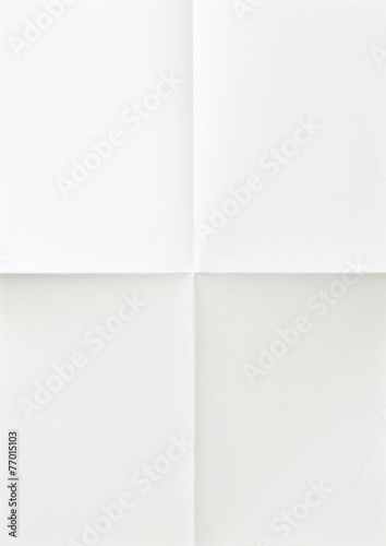 white sheet of paper folded in four