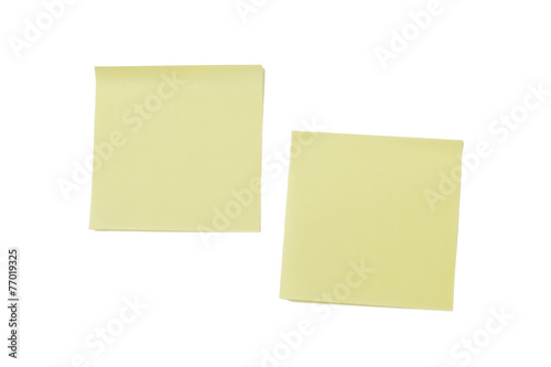 Two blank yellow Post-it notes, isolated on white