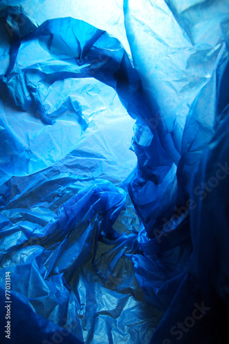 Abstract background of the insides of a blue plastic bag