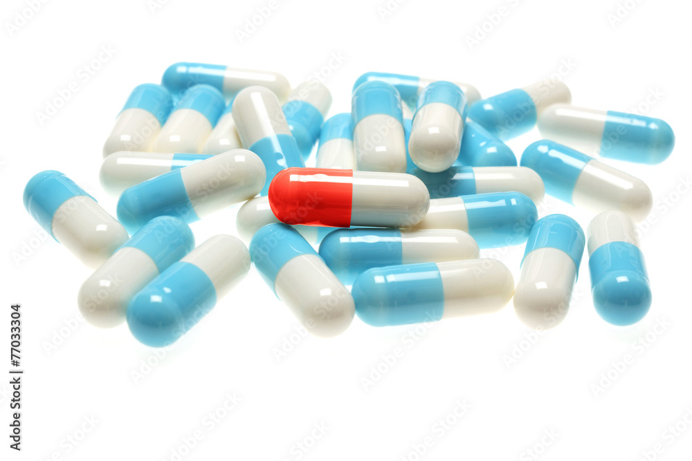 blue pills on white background