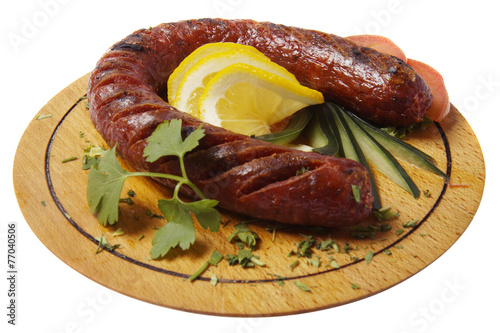 Grilled sausages and lemon