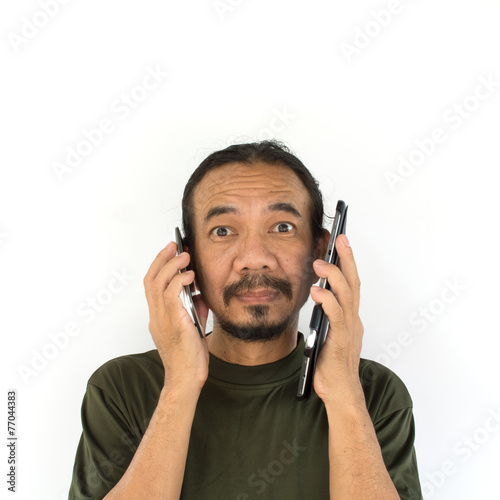 Old asian man using tablet-pc on white background.