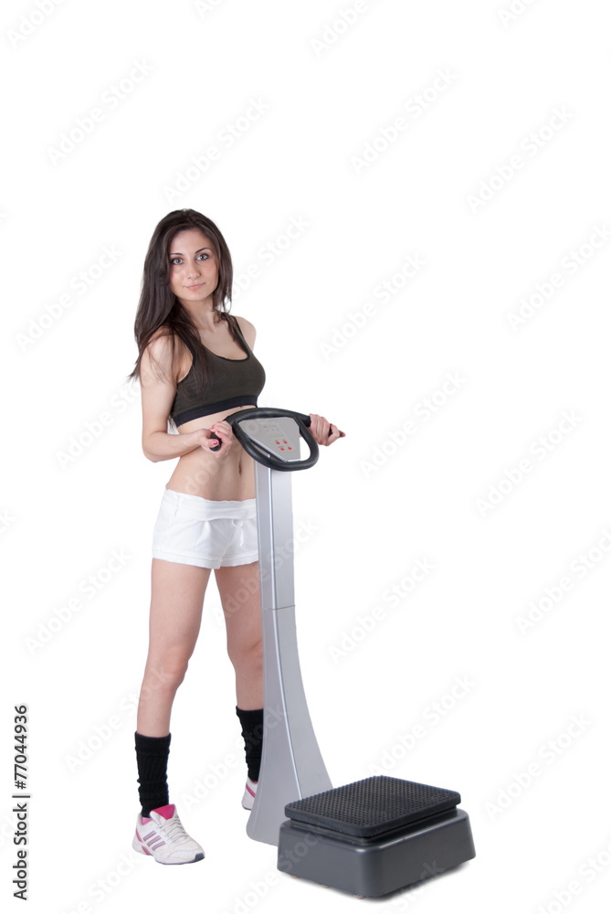 Young athletic woman with massage machine Young athletic woman with massage machine