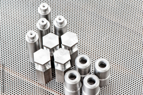 Iron details - shafts bolts nuts and cylinders. Metal engineerin photo