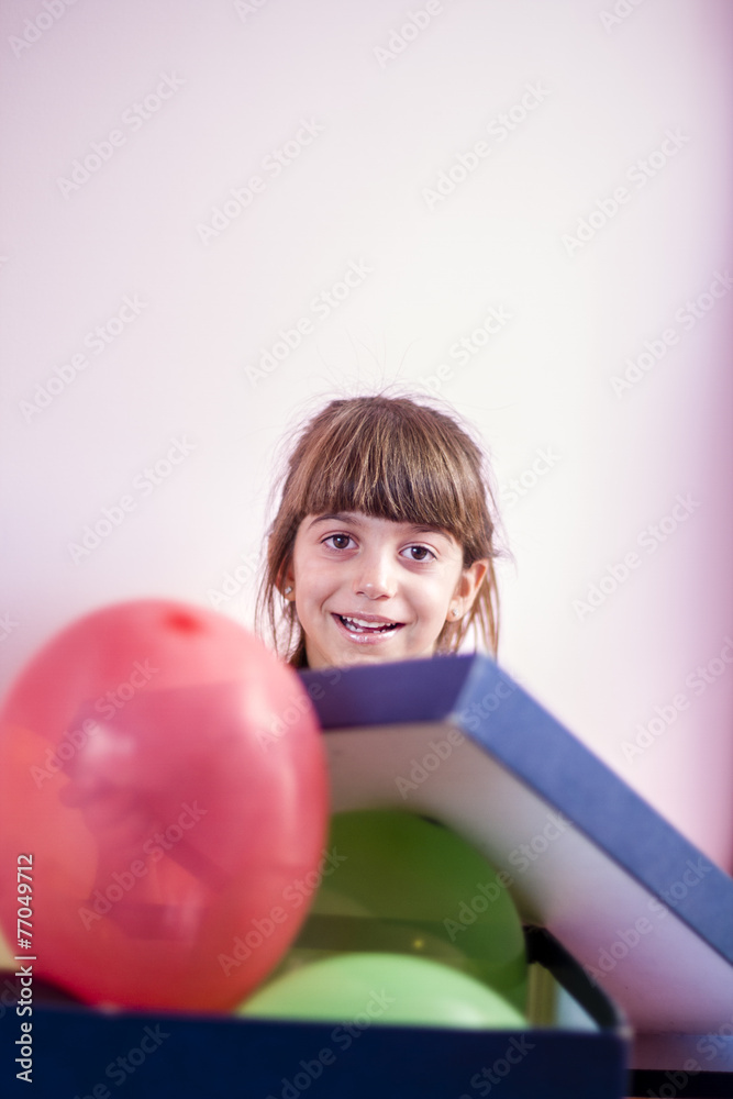 Little girl playing with balloons Little girl playing with balloons