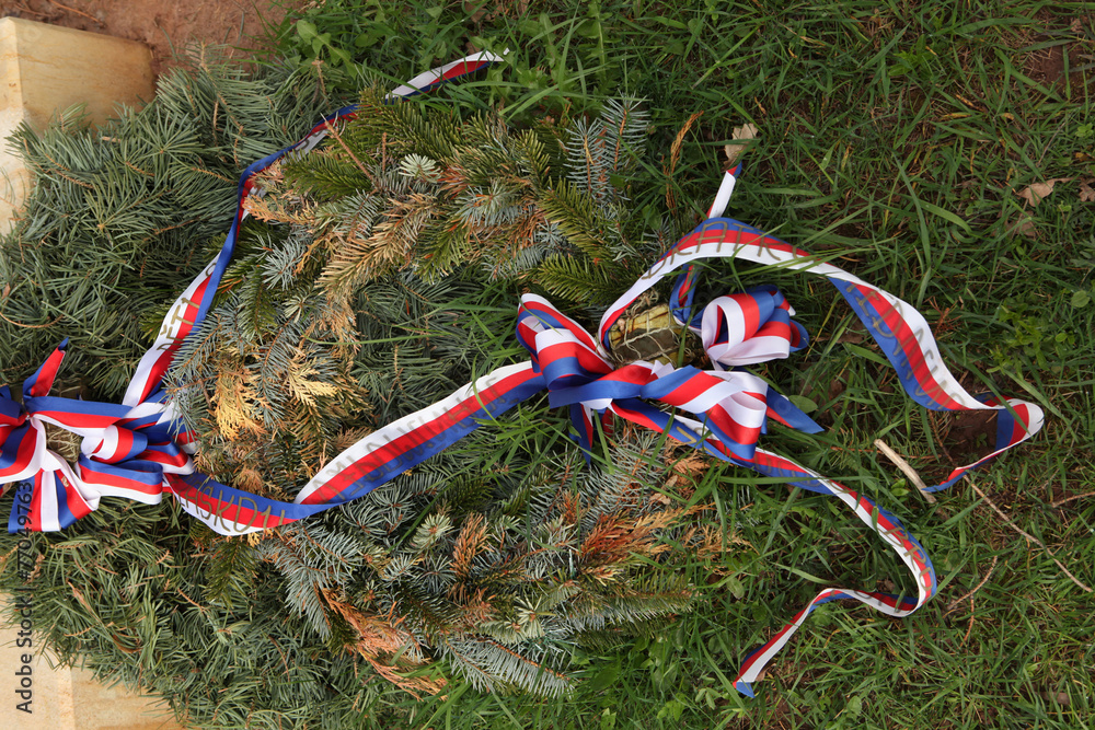 Firry wreath with Czech national ribbons.