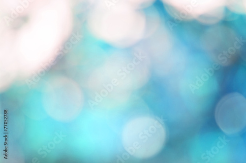 Abstract blur with bokhe of light through the trees