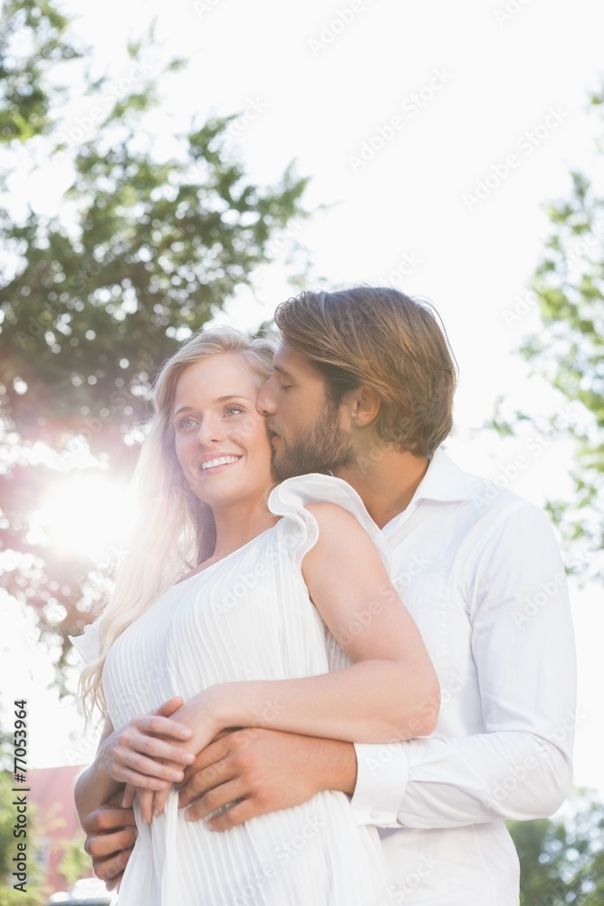 Cute couple hugging and smiling Cute couple hugging and smiling