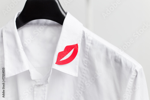 Fotografija Red lips on white men's shirt