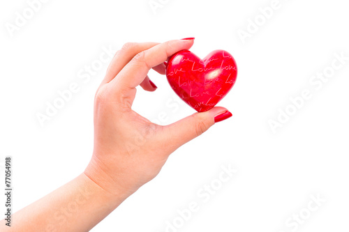 Heart shape in hands as love symbol