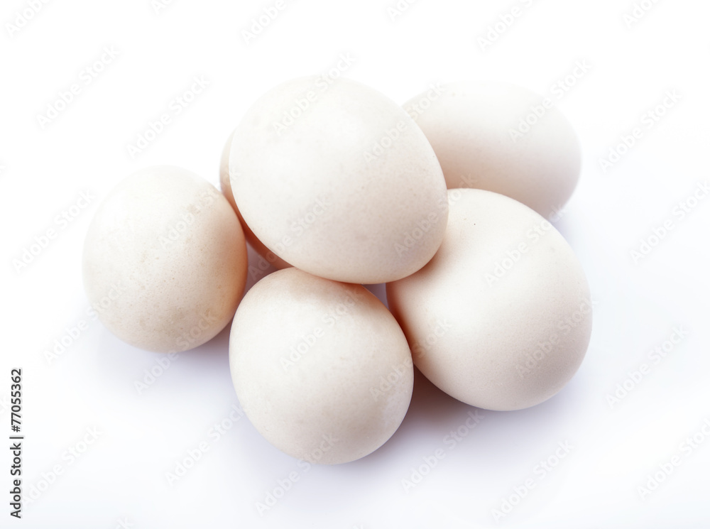 Fresh chicken eggs on white background