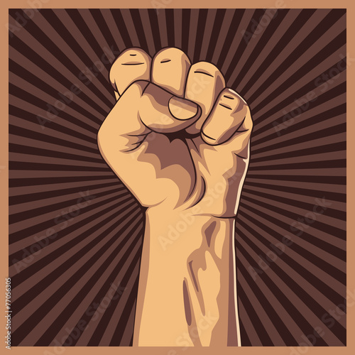 Clenched fist held high in protest background