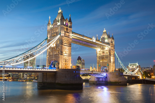 Tower Bridge at sunset & night twilight London, England, UK..