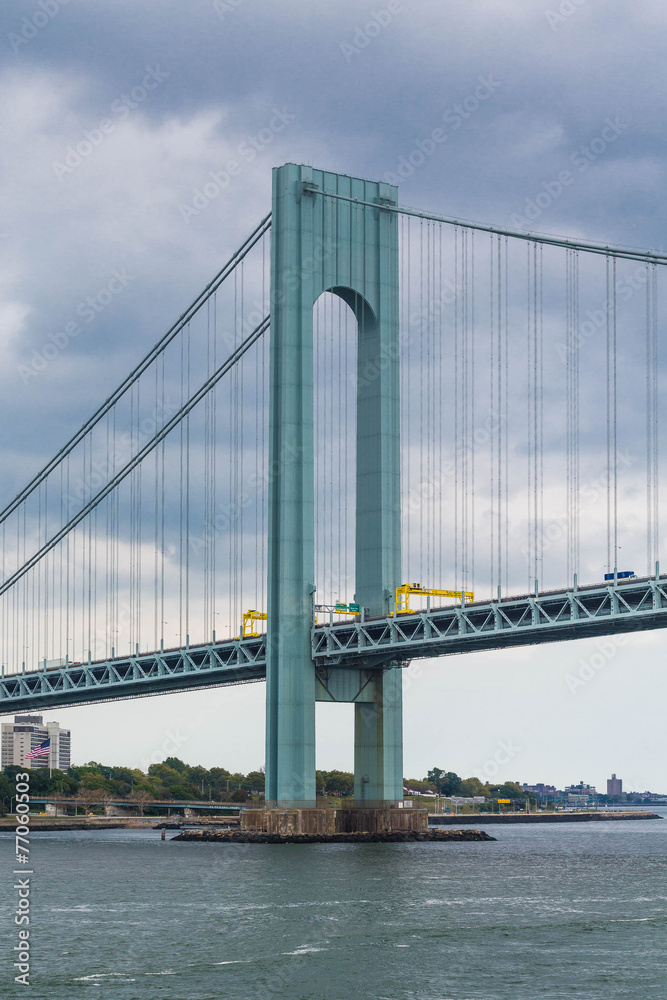 Naklejka premium Green Tower on Suspension Bridge
