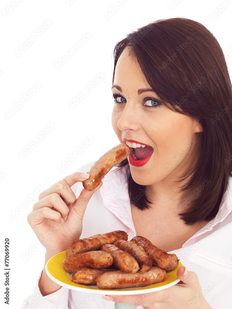 Young Woman Holding a Plate of Pork Sausages Young Woman Holding a Plate of Pork Sausages