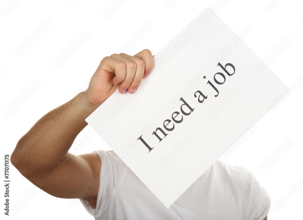 Sheet of paper with inscription I need a job in male hand Sheet of paper with inscription I need a job in male hand