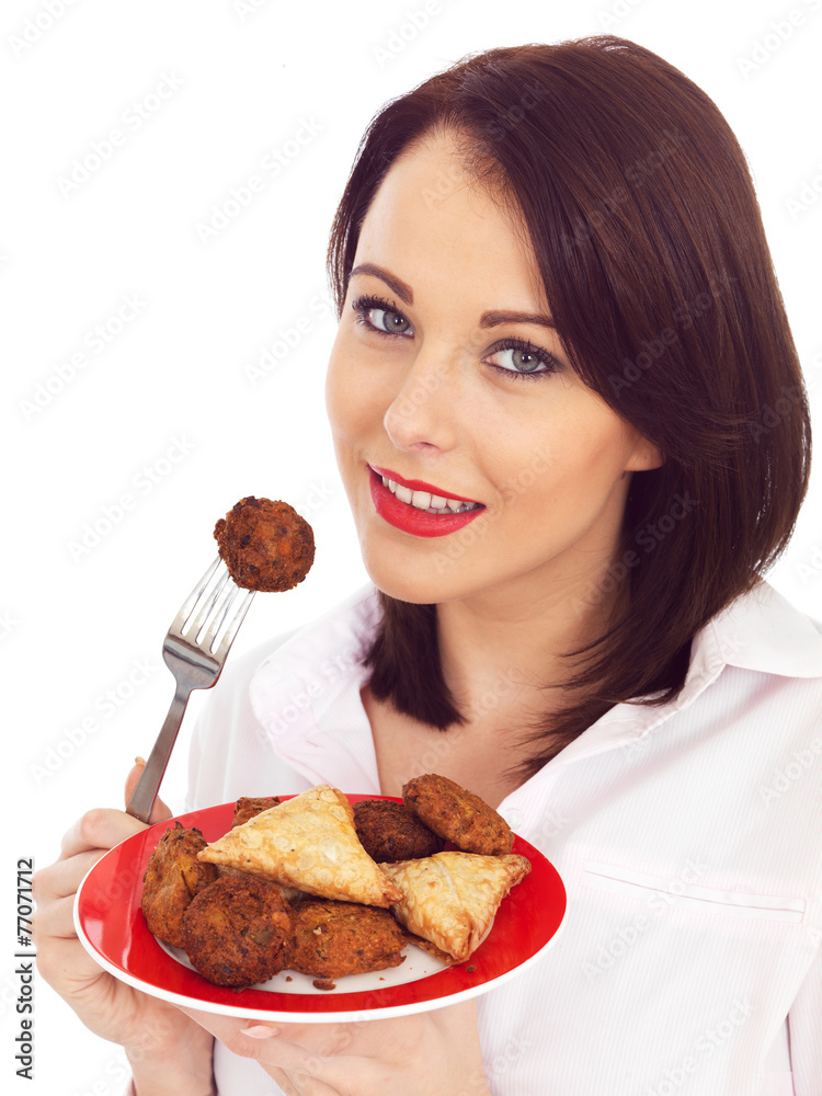 Young Woman Eating Indian Snack Food